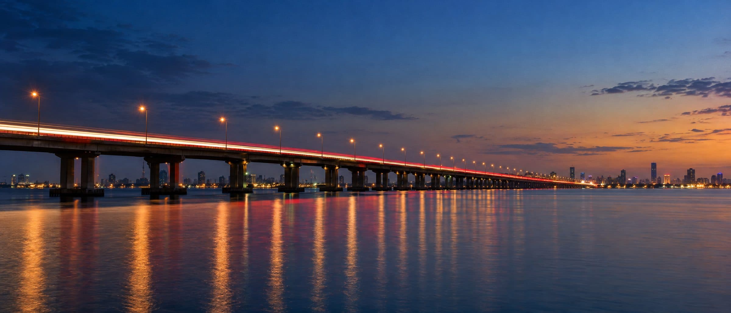Traffic on the Third Mainland Bridge in Lagos drawn into streams of light at blue hour