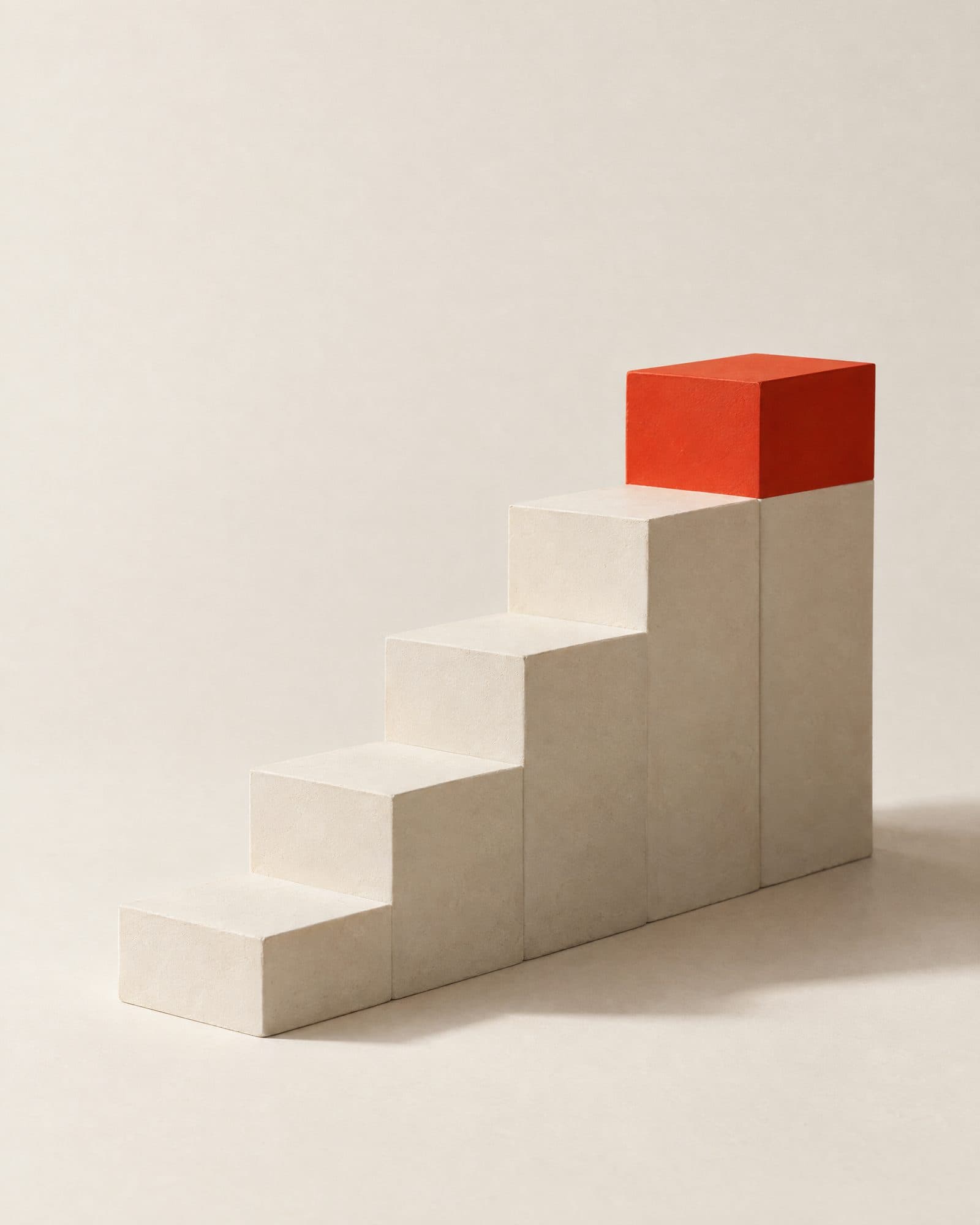 Off-white steps rising left to right with a red top step